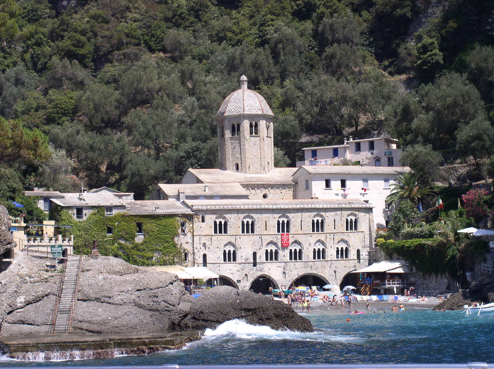 a beach scene is shown in the foreground of this building