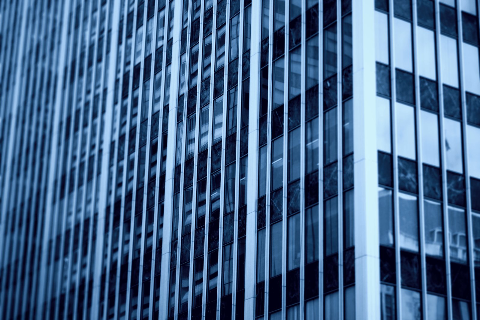 an image of glass windows in the front of a building