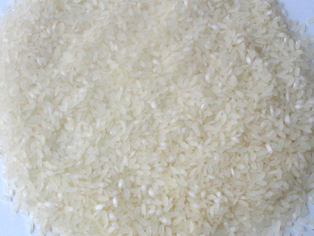rice is laid down on a white surface