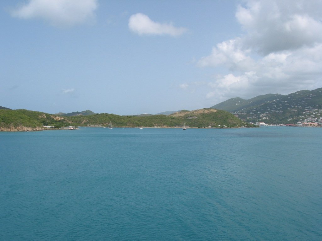 a large body of water near mountains