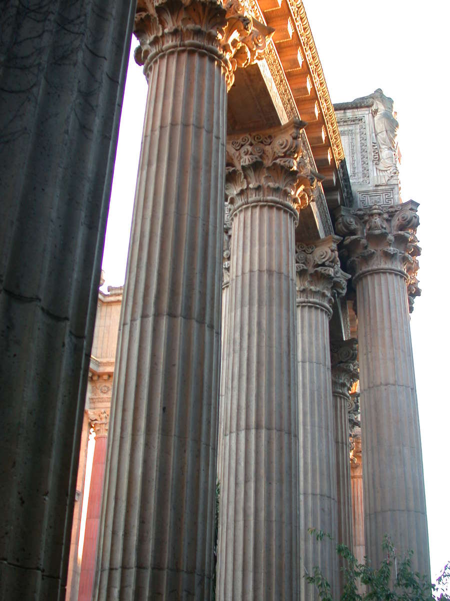 a number of stone columns with one standing up