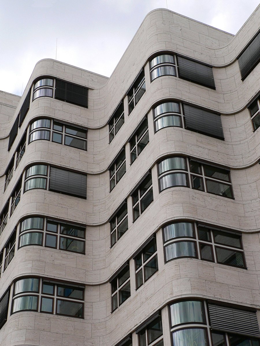 the side of a large building with many windows