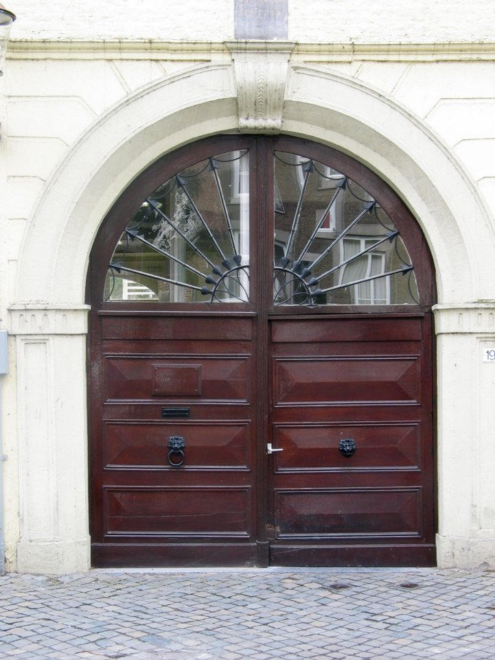 two large doors on the side of a building
