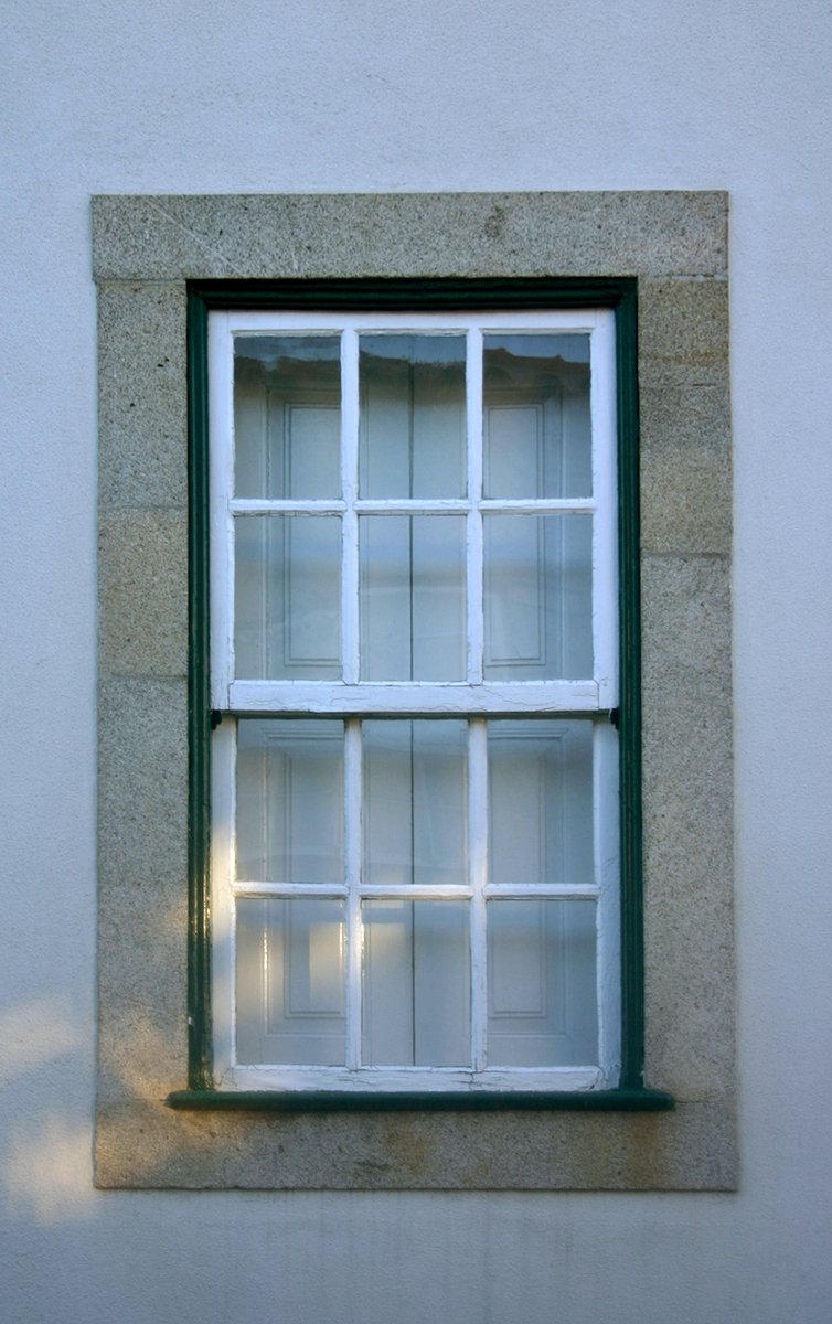 a windows on the wall of a house