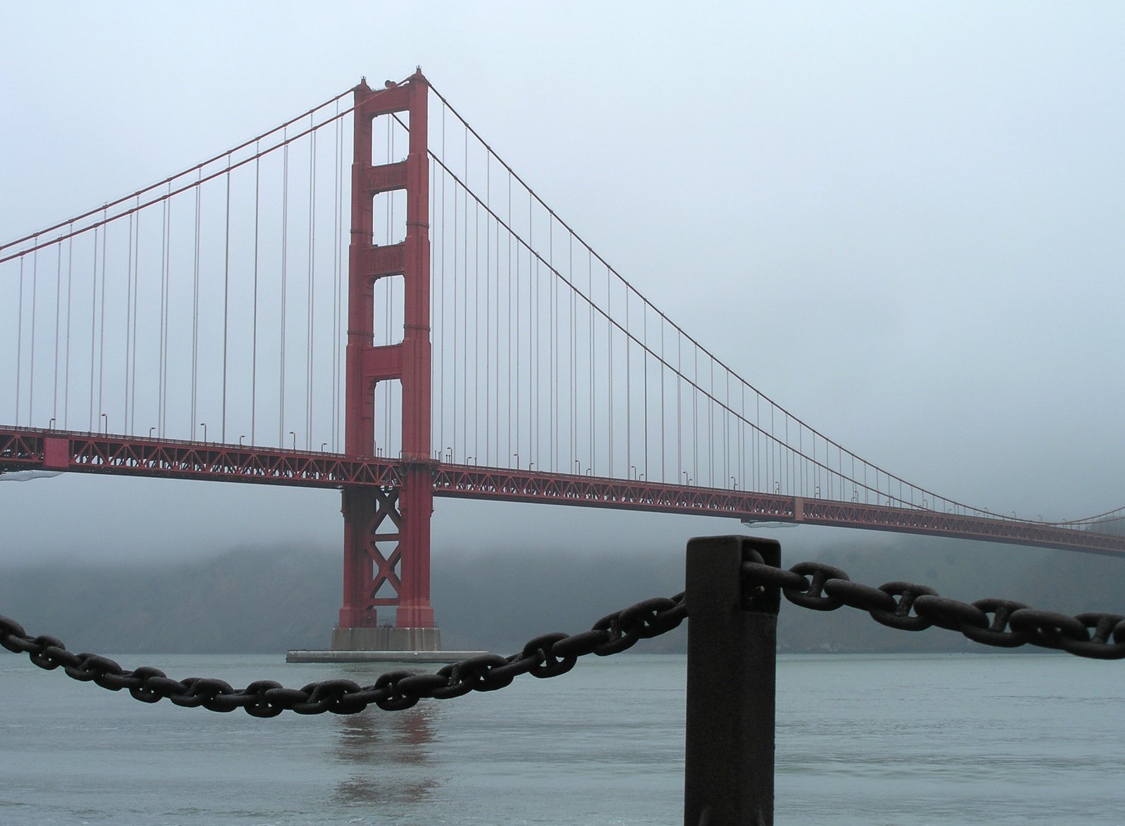 a very large bridge crossing a body of water