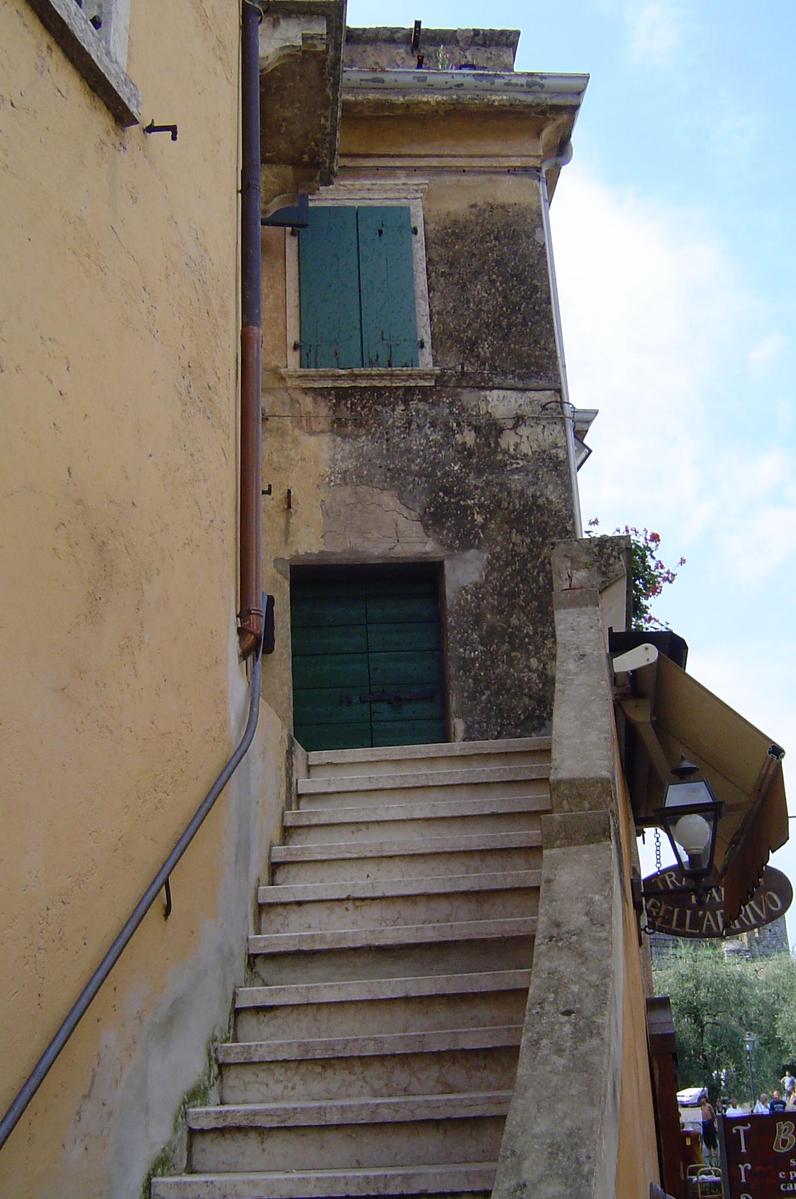 an old staircase in front of a building