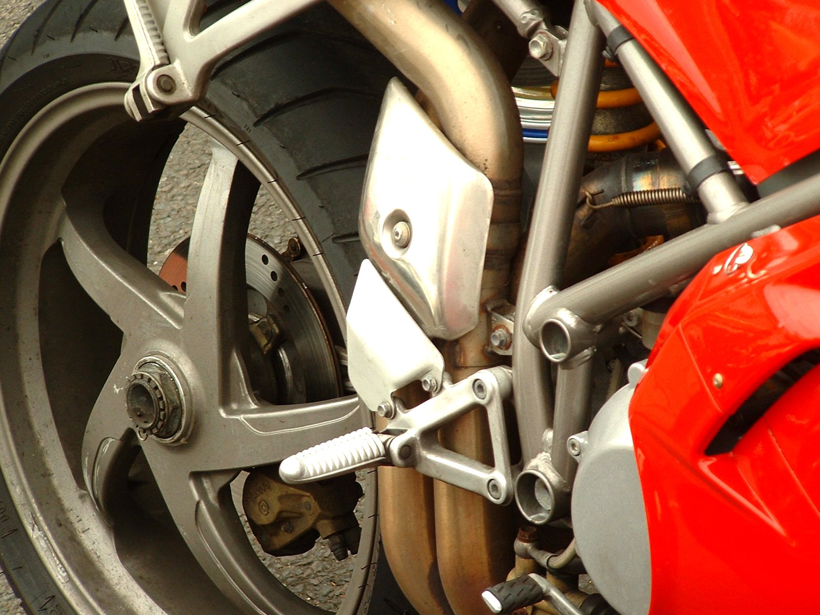 the rear wheel of a motorcycle with a ke and shock link