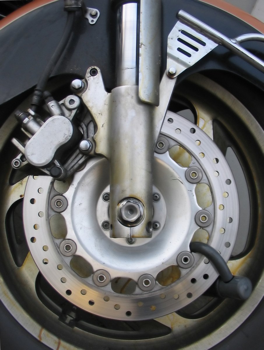 the ke parts of a motorcycle sit on a bike wheel