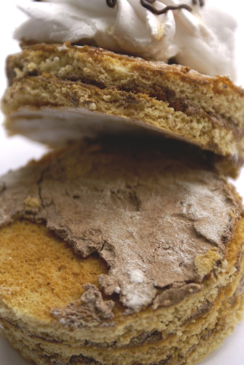close up of three cookies stacked on top of each other