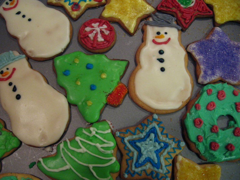 several decorated cookies that are arranged on a table