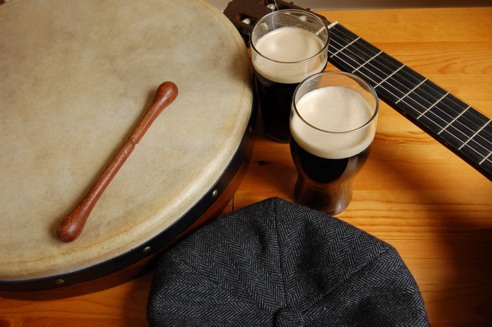 there is a guitar and a musical instrument on the table