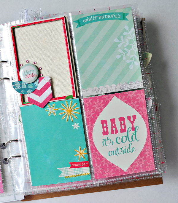 a baby its cold outside pocketed journal with pink blue and green