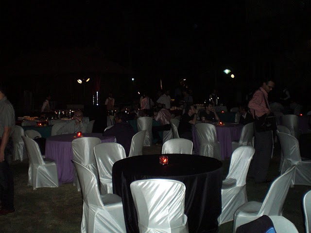 a group of tables sitting next to each other at a party