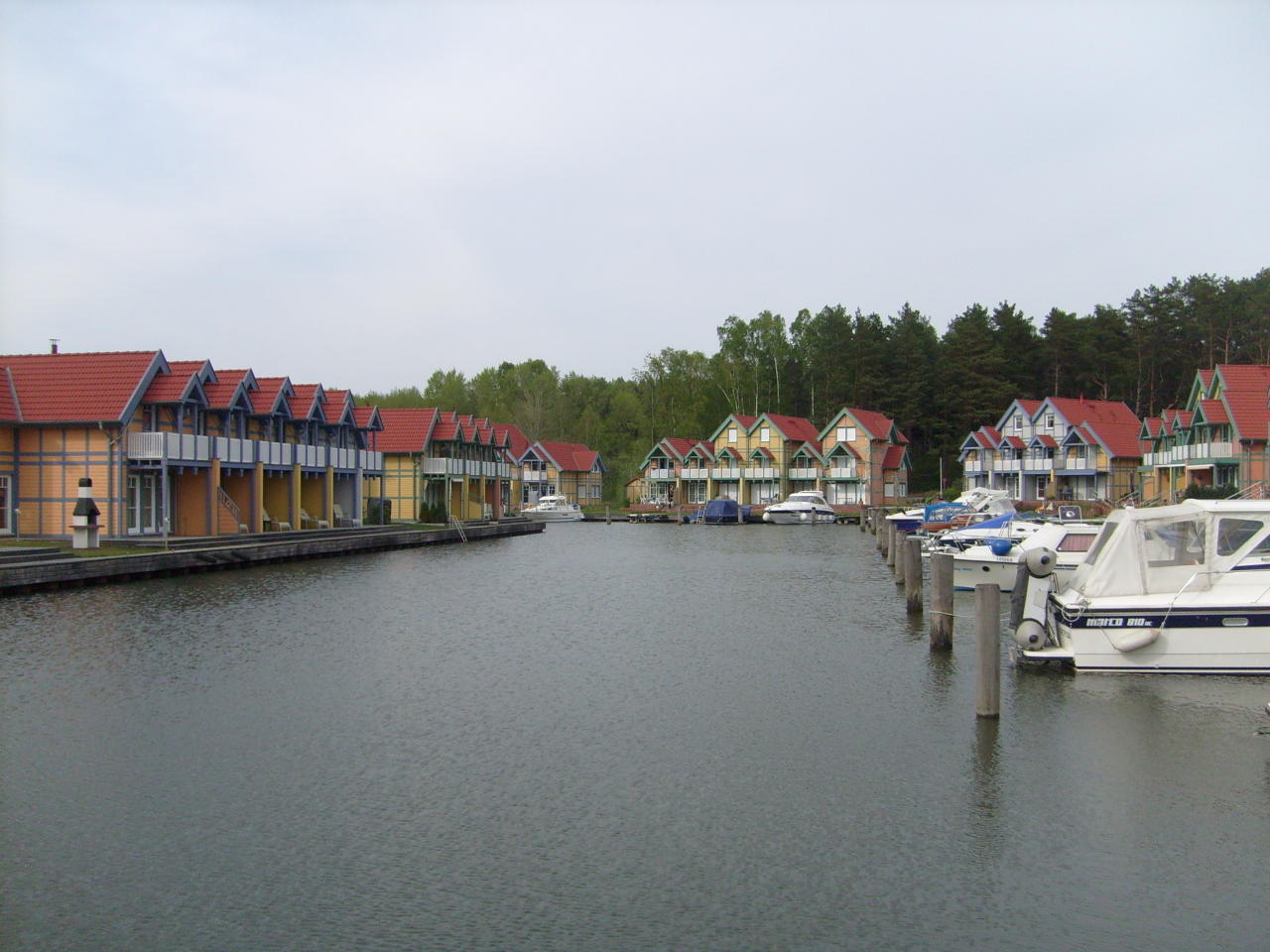 a row of houses along side the water