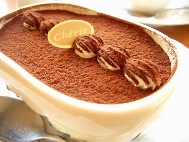 a close up of a dessert in a bowl on a table