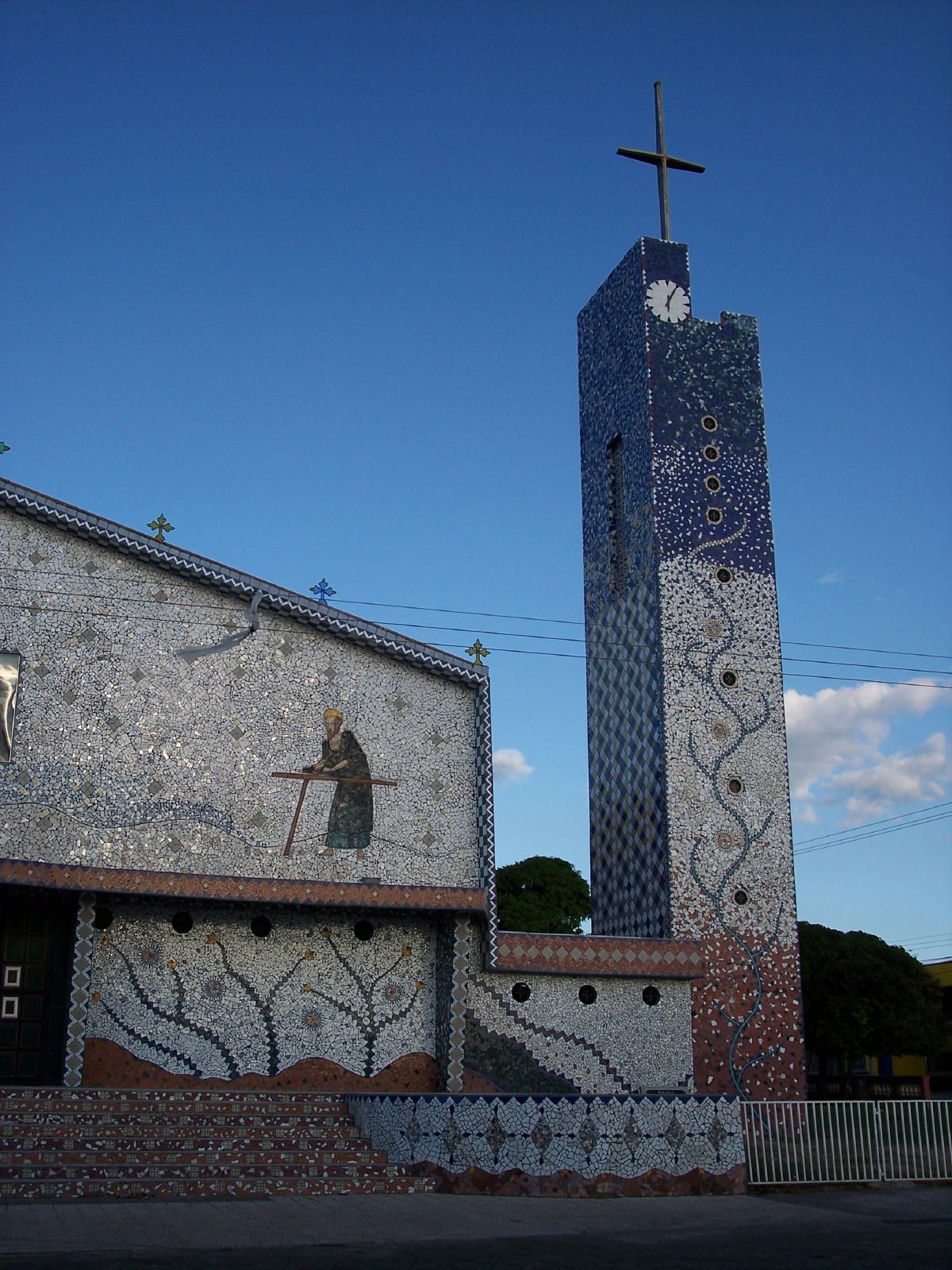 a painting depicting a man on the wall and cross on the top