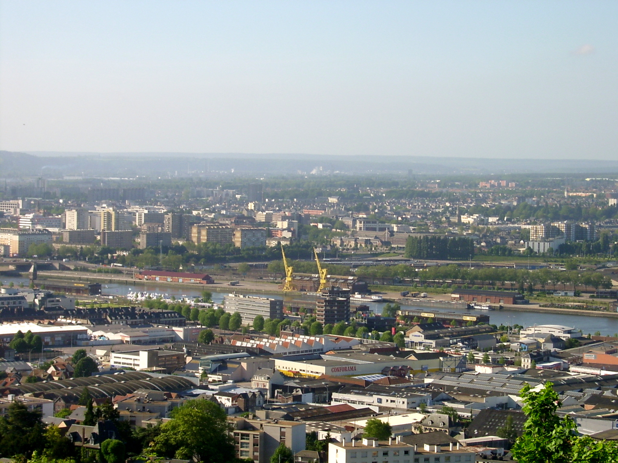 a view of a city with several large structures