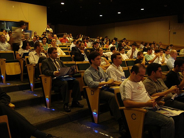 the large crowd is watching the speakers at the lecture