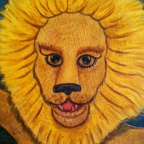 the face of a yellow lion, by a child's painting