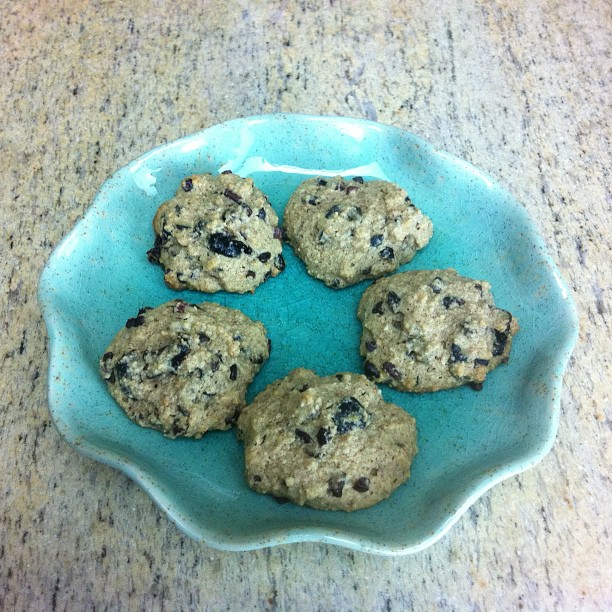 chocolate chip cookie cookies sitting on top of a turquoise plate