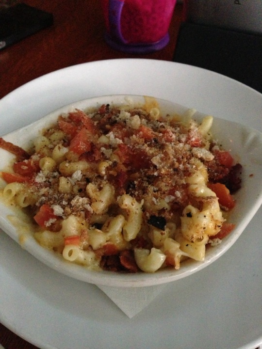 some pasta on a plate with a fork