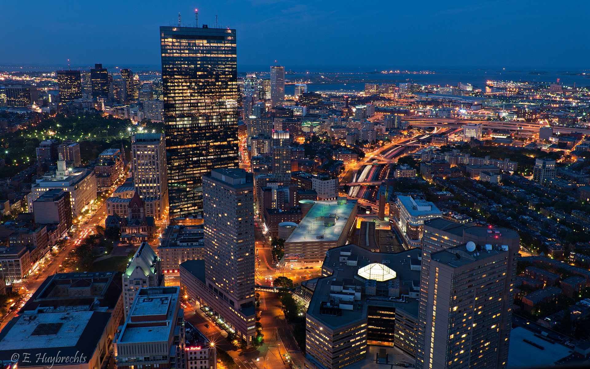 an aerial view of city buildings at night