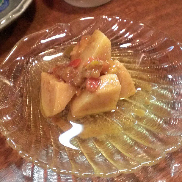 a plate with food on top sitting on a table