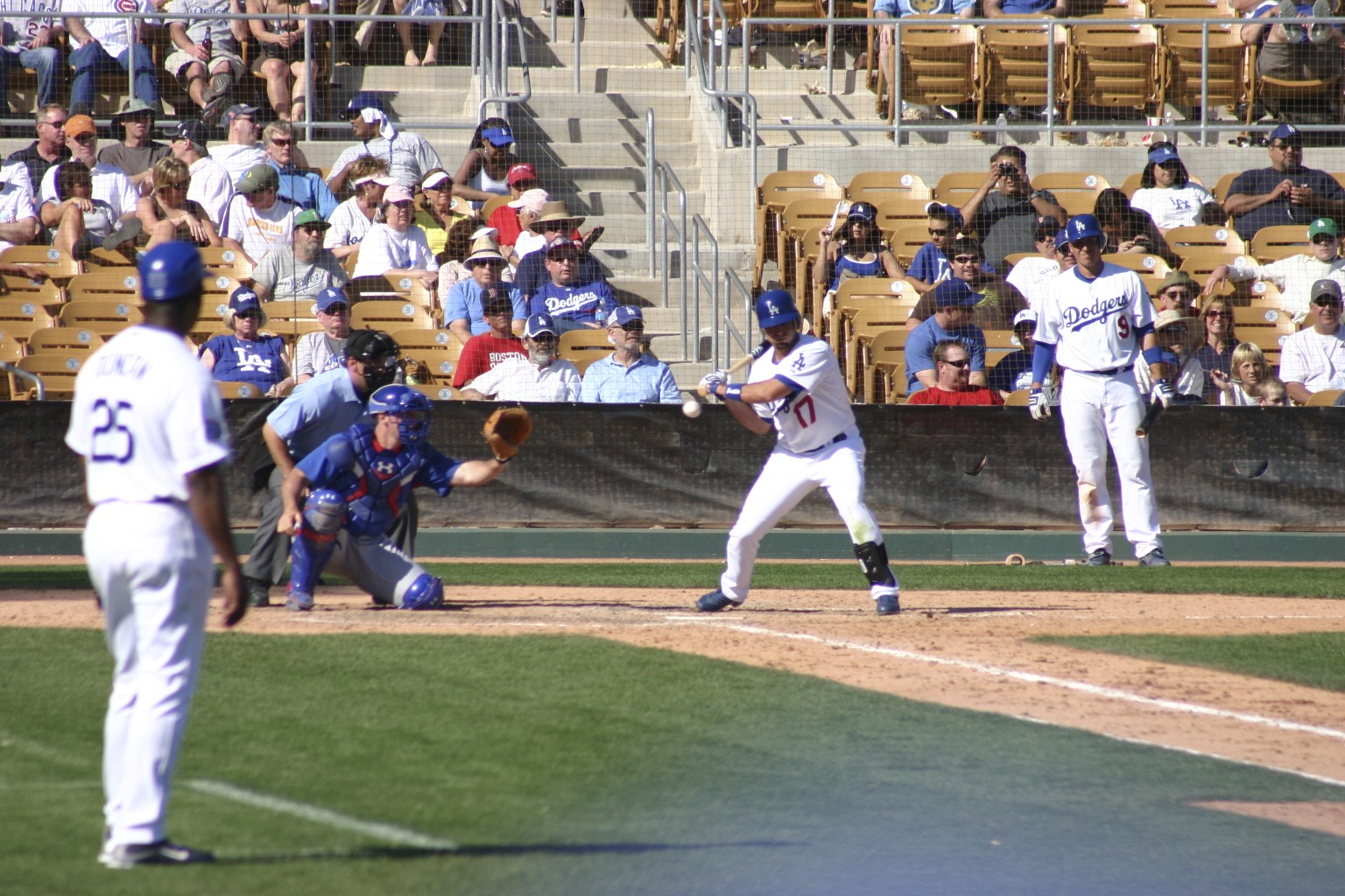 there is a baseball player that just hit the ball