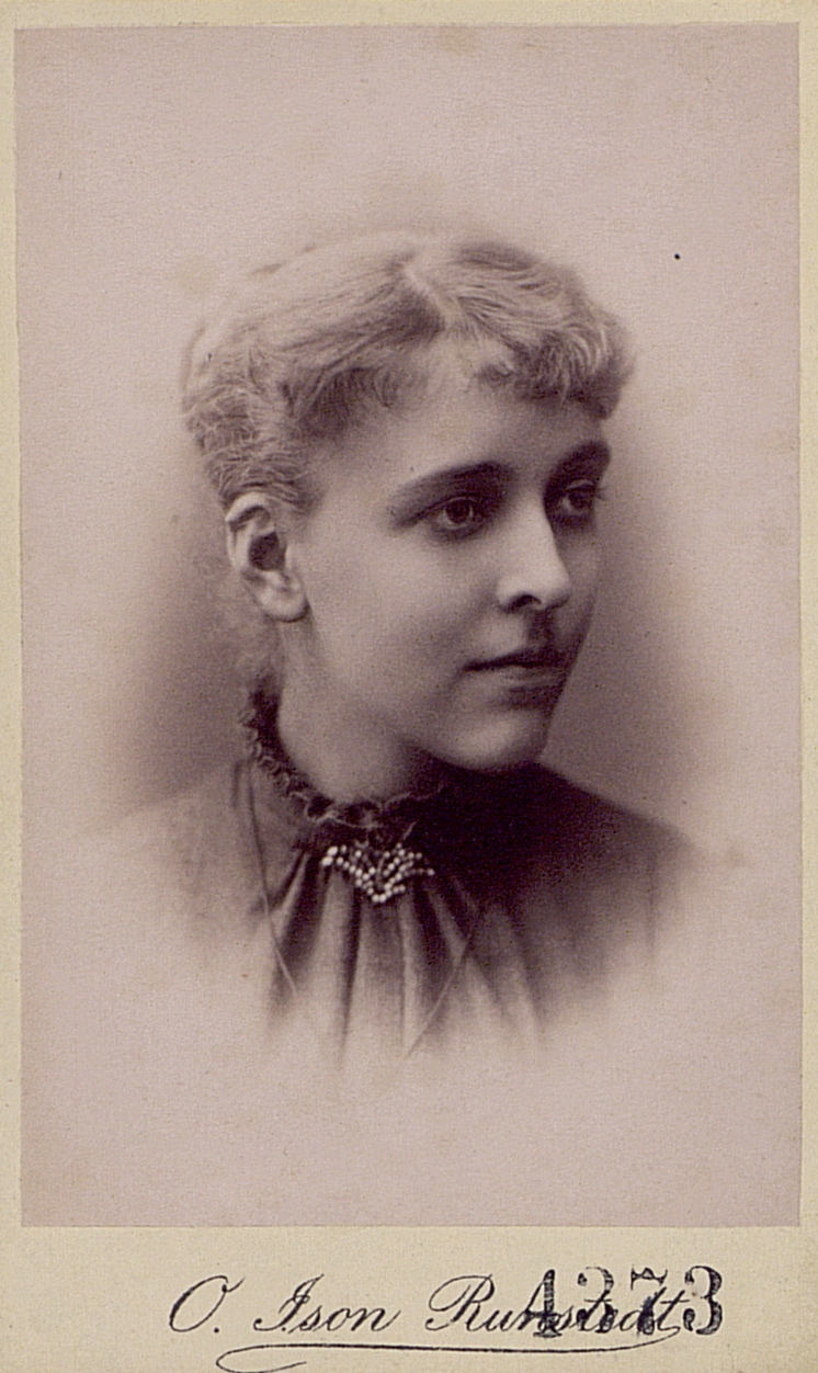 an old picture of a woman with short hair