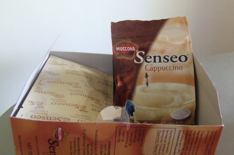 an opened box of coffee with spanish breakfast