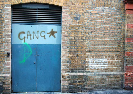 a garage door has graffiti painted on it