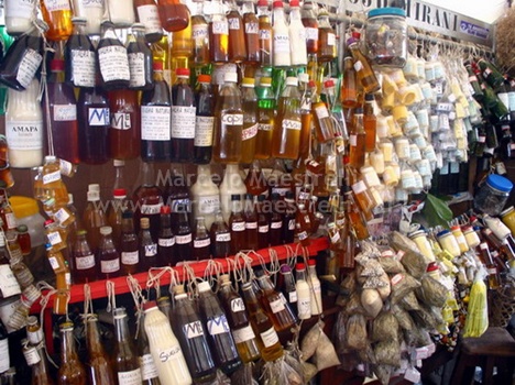 a lot of alcohol bottles and bottles on display