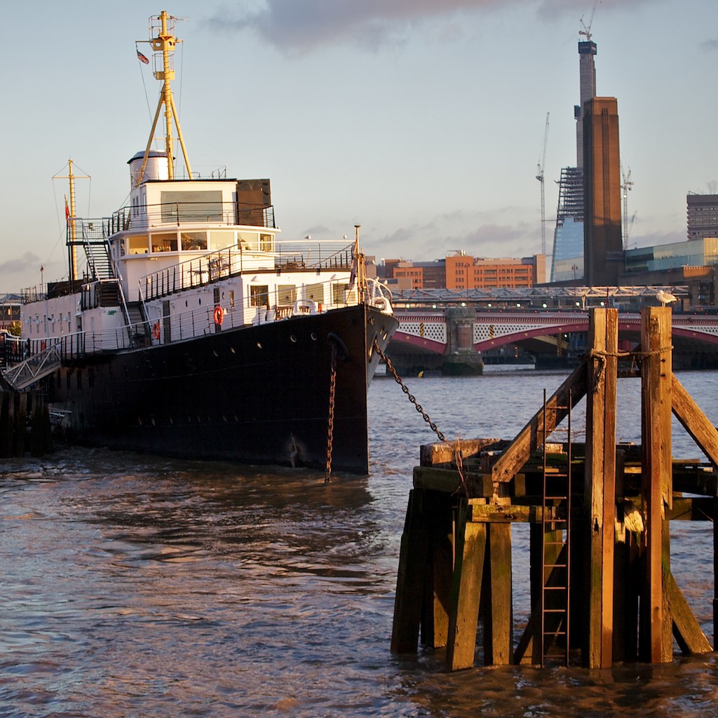 a large boat is docked in the water