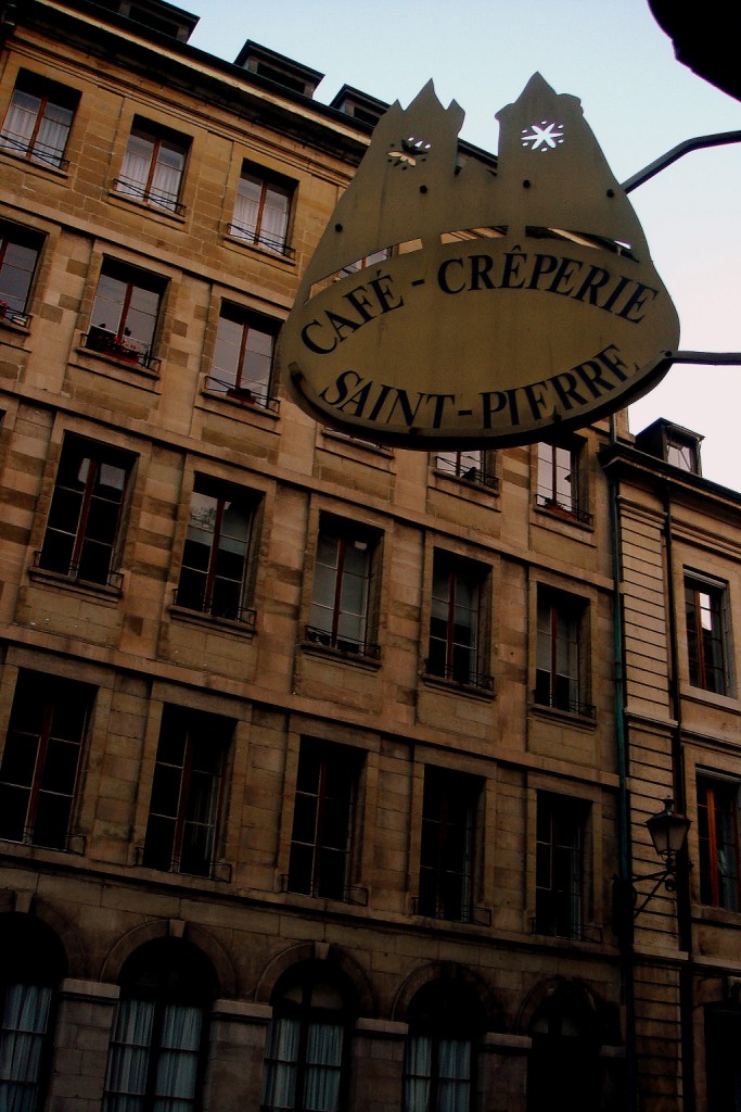 some buildings and a sign in front of it