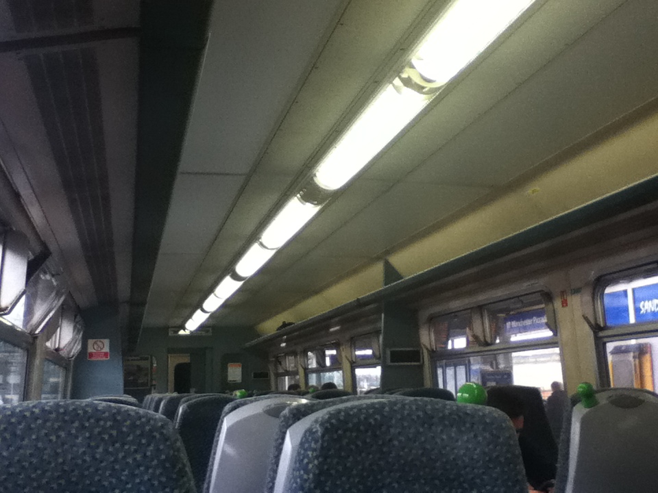 an empty train car with windows facing forward