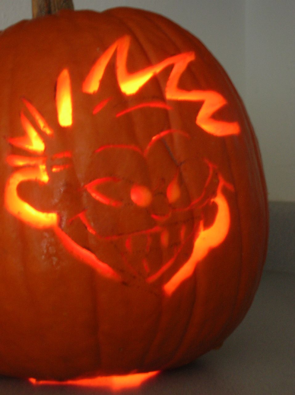 an carved pumpkin sitting on top of a counter