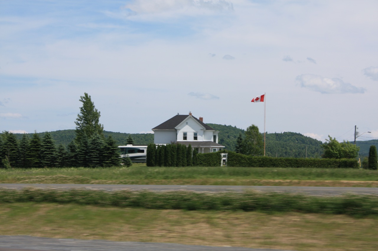 the view from across the road to a large house