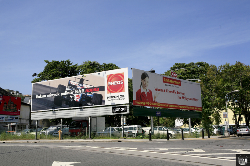 this is a billboard displaying a po of a racing car
