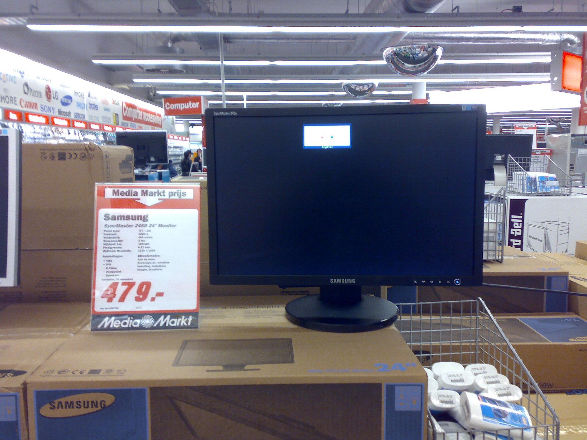 there are many large flat screen televisions at this store