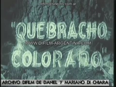 a po taken in old time showing a sign saying, queacho color al doble