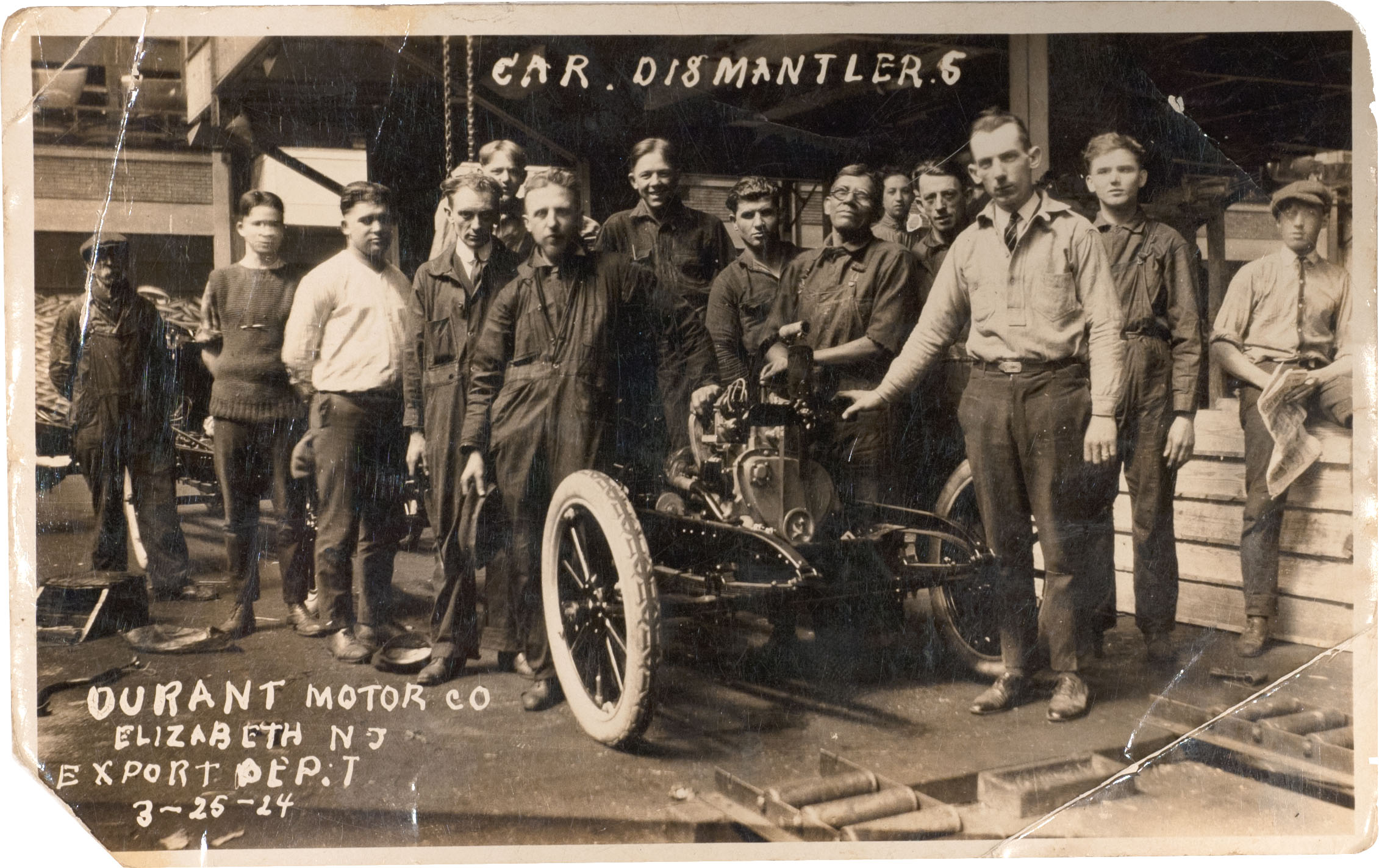 a group of men in uniform standing in front of a car