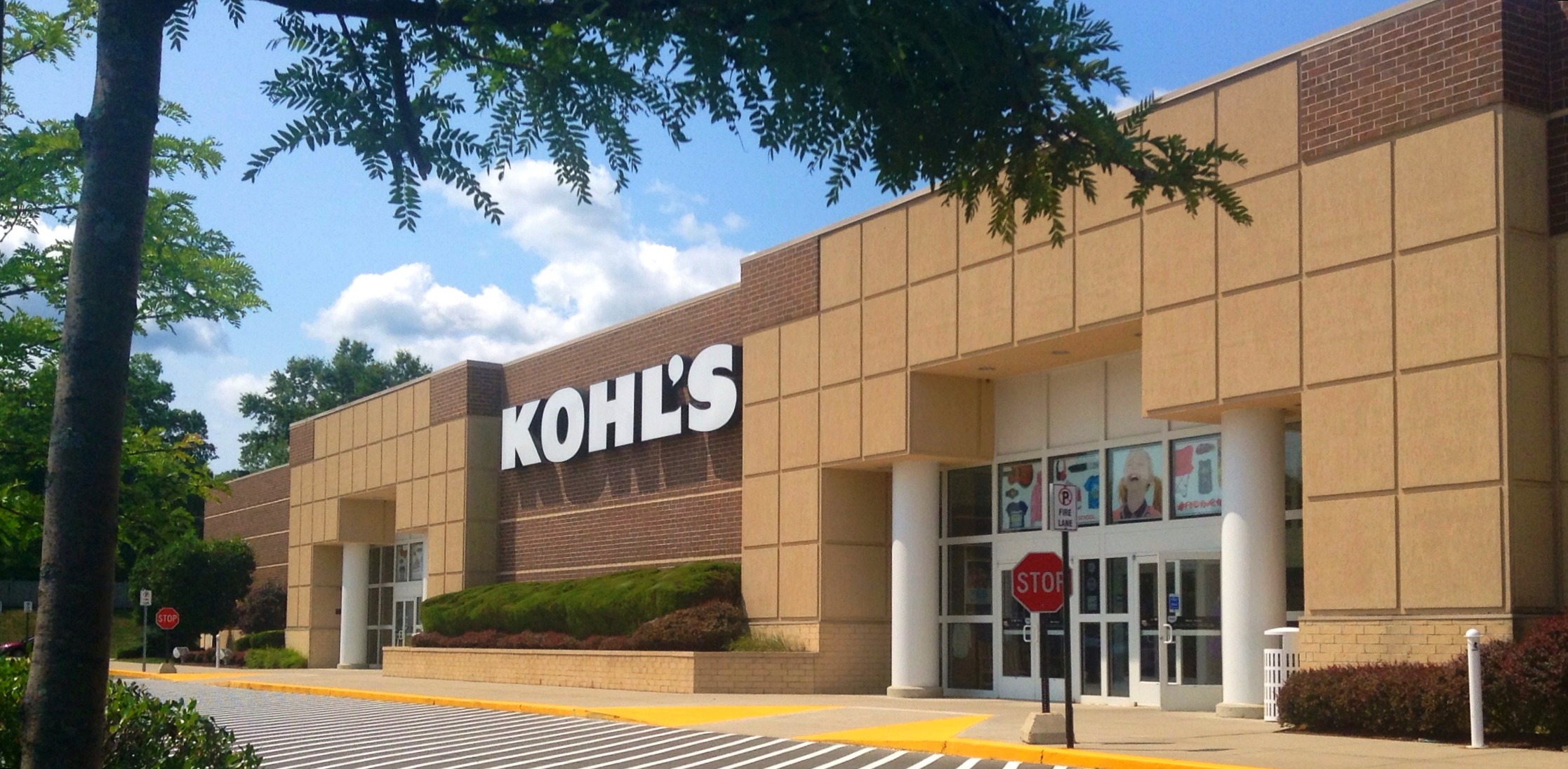 a shop in the front of a business with a sign that says kohl's on the side