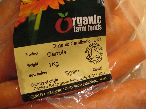 a packaged package of organic carrots is on display