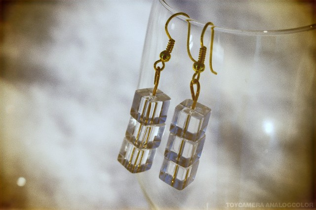 the large glass cube earrings are gold