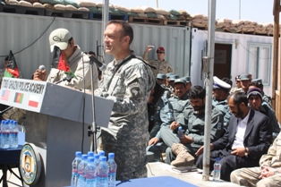 a man in uniform is giving a speech