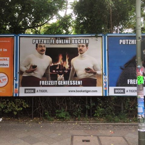 three large billboards for the movie pittuzzile online bucher, showing one man at fire