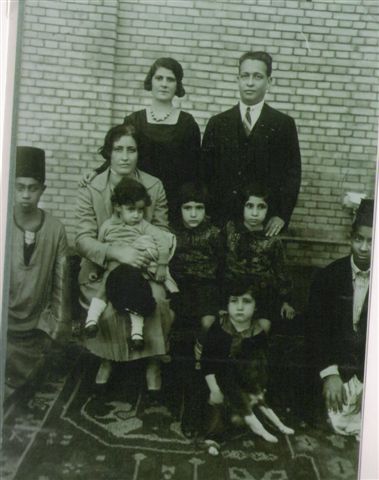 an old black and white picture of several people