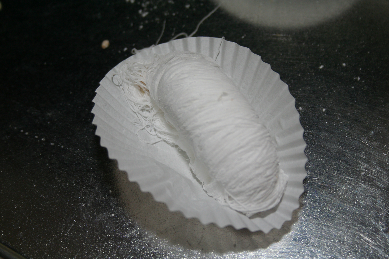 a white plate containing some type of substance in it