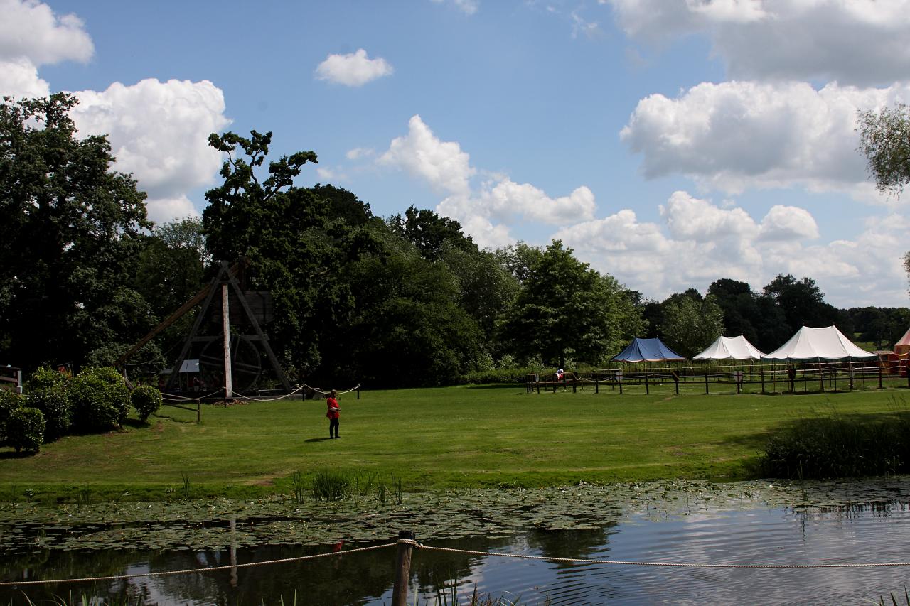 a small tent set up in a field