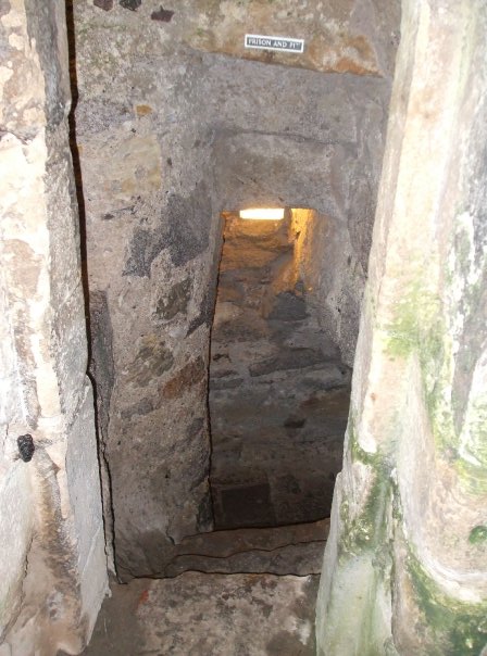 a tunnel between the two walls in the rock